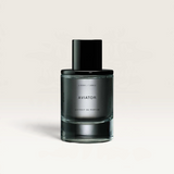 House of Holabox Solid State Aviator 50ml Extrait de Parfum glass bottle with black cap on a reflective surface
