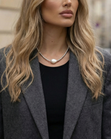 House of Holabox Izoa Amarae necklace featuring a large baroque freshwater pearl on a rhodium-plated textured bead chain.