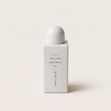 House of Holabox Beauty Engine Sweet Almond and Manuka Honey shower oil in a white 250ml bottle with water droplets.