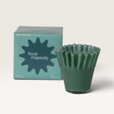 House of Holabox Ben David Soy Kiki candle in green with a ruffled glass vessel and matching floral rhapsody box
