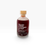 House of Holabox The Peel Thing blackberry and lavender syrup in a 250ml frosted glass bottle with a wooden cap.