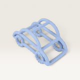 House of Holabox light blue silicone car-shaped teether with textured grip for soothing teething babies