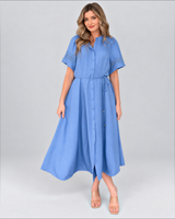 House of Holabox blue midi dress with button-through front, tie waist, and scalloped cutwork sleeves on a model