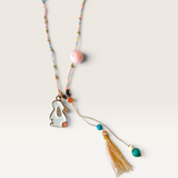 House of Holabox Blush Bunny necklace with multi-colored beaded chain, metal rabbit charm, and soft tassel detail.
