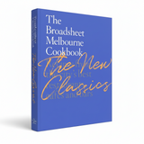 House of Holabox Broadsheet Melbourne Cookbook The New Classics featuring a vibrant blue cover with elegant text.