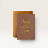 House of Holabox brown Father's Day card with gold foil cursive lettering and a matching metallic gold envelope