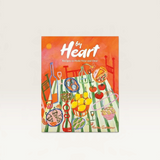 House of Holabox By Heart cookbook featuring a vibrant, painted illustration of a picnic table with seasonal food.