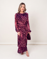 House of Holabox Carmel maxi dress in cerise safari animal print with long sleeves on a model