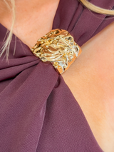 House of Holabox Jasmine jumpsuit in cherry chocolate featuring a textured gold buckle on an asymmetric neckline