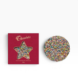 House of Holabox Chocolatier milk chocolate speckle with colourful sprinkles in a festive red star-window gift box