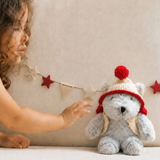 House of Holabox and the little dog laughed Christmas Alfred bear with corduroy ears and a red pom pom hat