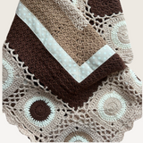 House of Holabox hand crochet cotton blanket in chocolate and cream with polka dot grosgrain ribbon trim