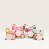 House of Holabox Dancing with Juniper floral heat pillows filled with organic lavender and wheat for muscle relief.