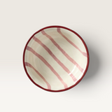 House of Holabox Ecology Porto Sable stoneware serving bowl in raspberry with handpainted red stripes and maroon rim