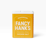House of Holabox Fancy Hank’s Chicken Salt seasoning in a yellow rectangular shaker tin with white lid.