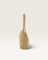 House of Holabox Reverie metallic gold beaded chain bag shown from the side, featuring a polished chain handle.