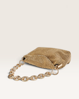 House of Holabox gold metallic beaded chain bag with a chunky link handle, perfect for evening events.