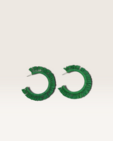 House of Holabox large green raffia hoop earrings with a textured circular design and lightweight stud backing.