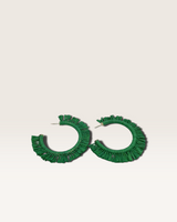 House of Holabox large green raffia hoop earrings with a textured fringe design and lightweight stud closure.