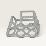 House of Holabox grey silicone bulldozer teether for babies with textured surface for soothing relief