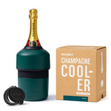 House of Holabox Huski deep teal champagne cooler with a bottle of Bollinger and the included BubbleLock stopper.