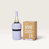 House of Holabox Huski lilac wine cooler with a bottle inside next to its branded cardboard packaging box