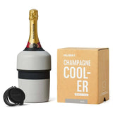 House of Holabox Huski stone grey champagne cooler with a bottle of sparkling wine and a BubbleLock stopper.