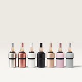 House of Holabox Huski wine coolers in various metallic and matte finishes holding wine bottles