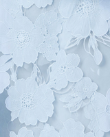 House of Holabox icy blue sheer fabric with intricate floral embroidery and delicate lace detailing