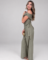 House of Holabox Imogen olive green cotton-linen pant set with drop-shoulder top and wrap-tie trousers on a model