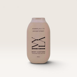 House of Holabox Ivy Ila Oxford Street body custard in a beige bottle with minimalist black typography.