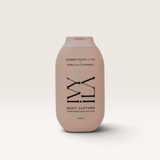 House of Holabox Ivy Ila Vanilla Caramel body custard in a beige 200ml bottle with minimalist black typography.