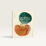 House of Holabox cookbook titled The Japanese Art of Pickling and Fermenting with abstract green and orange art.