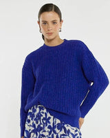 House of Holabox Kira Cable Jumper in cobalt blue, a soft knit with dropped shoulders and cable rib design.