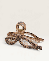 House of Holabox leopard print tortoiseshell hair claw with a rose gold-toned inner frame for everyday styling.