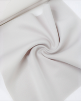 House of Holabox light grey fabric with a soft, swirled texture and matte finish
