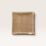 House of Holabox light rust organic cotton waffle tea towel with a textured stone-washed finish