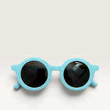 House of Holabox Little Drop kids sunglasses in light blue with round frames and UV400 protective lenses