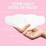 House of Holabox Lula self-warming body patch held in hand, showing air-activated design for period and muscle relief.