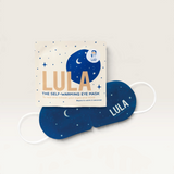House of Holabox Lula self-warming eye mask in a festive navy blue pouch with star and moon design for relaxation.
