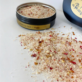 House of Holabox Margarita Confetti cocktail salt rim with dried citrus and flower petals in a black tin
