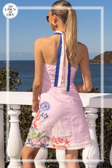 House of Holabox The Med mini dress in pink linen-cotton blend with blue and white halter straps and coastal print