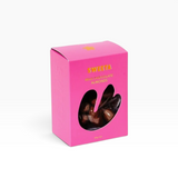 House of Holabox Sweeta milk chocolate coated almonds in a vibrant pink box with a cutout window