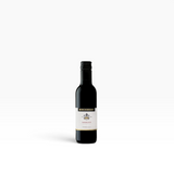 House of Holabox Minchinbury Merlot 187ml piccolo wine bottle with a black screw cap on a black background.