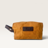House of Holabox Valor mustard waxed canvas toiletry bag with brown leather trim and side handle