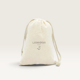 House of Holabox Little Drop Birdie Bundle nesting set stored in a natural cotton drawstring storage bag