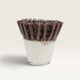 House of Holabox Ben David soy blend candle in a decorative nude velvet glass vessel with a ruffled rim