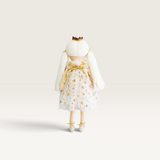House of Holabox Alimrose Penelope Princess doll with long white hair and a gold star tulle dress with a back bow.