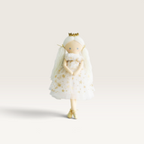 House of Holabox Penelope Princess doll with long yarn hair, wearing a white tulle dress with gold star accents.