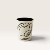 House of Holabox Jones & Co Pepe Limone ceramic cup with a black interior and hand-drawn lemon illustration.